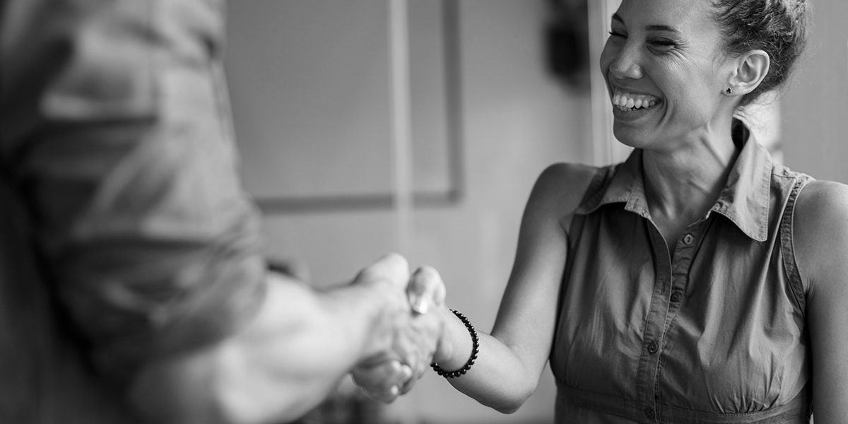 New beginning Welcoming a new colleague with a handshake